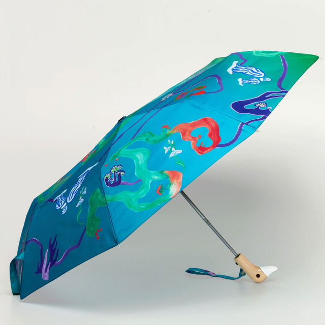 Colorful umbrella with abstract design on a white background