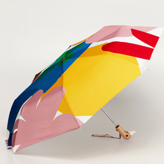 Colorful umbrella with abstract design on a white background