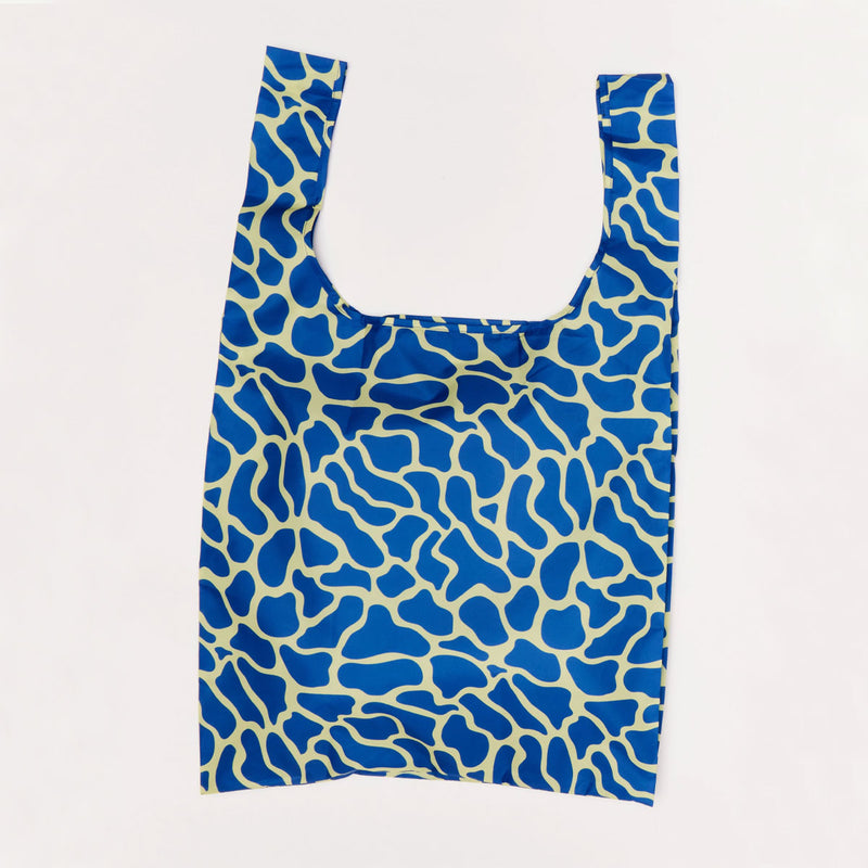 Reusable shopping bag with blue and yellow pattern on a white background