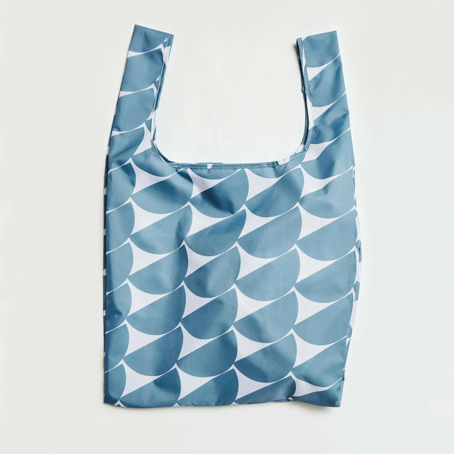 Reusable bag with blue and white pattern on a light gray background