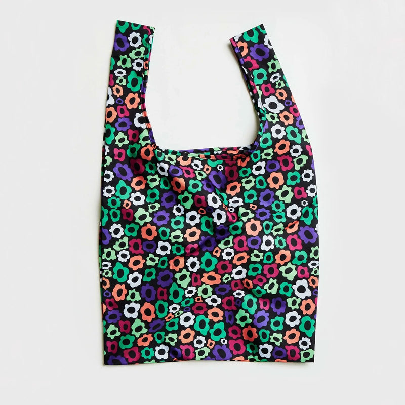 Reusable shopping bag with a colorful floral pattern on a white background