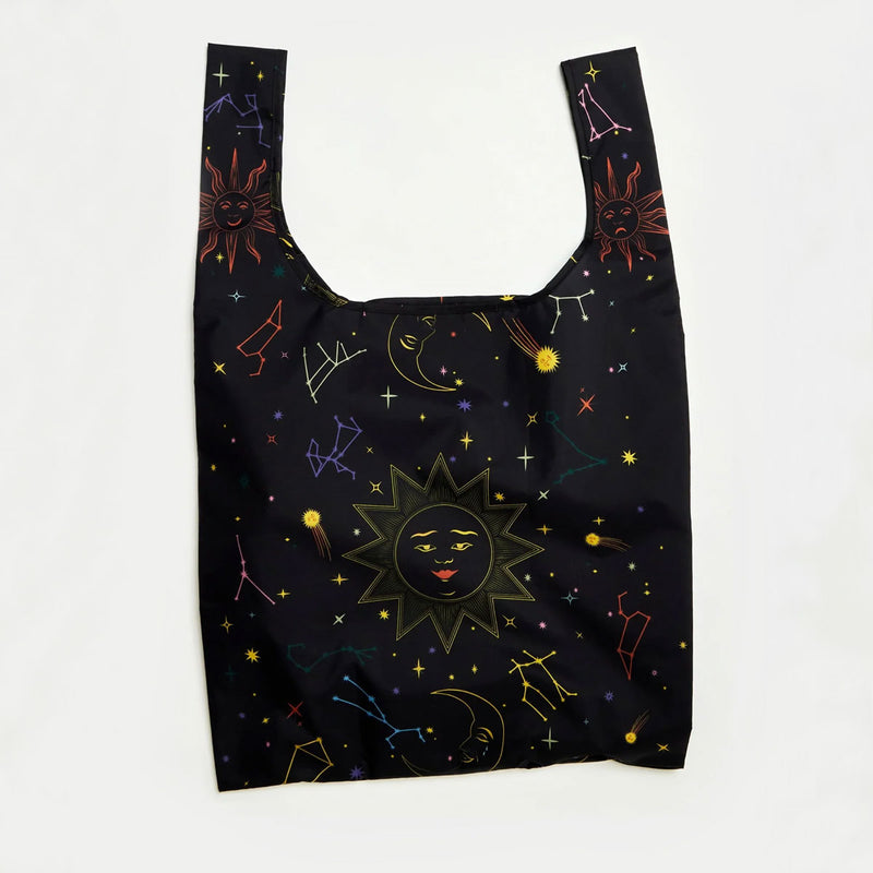 Black reusable bag with celestial designs on a white background