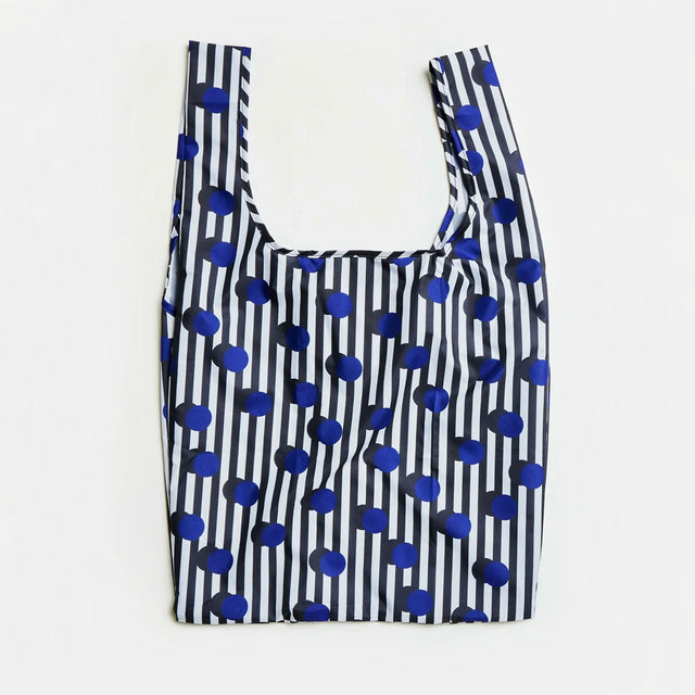 Reusable bag with blue polka dots and black stripes on a white background